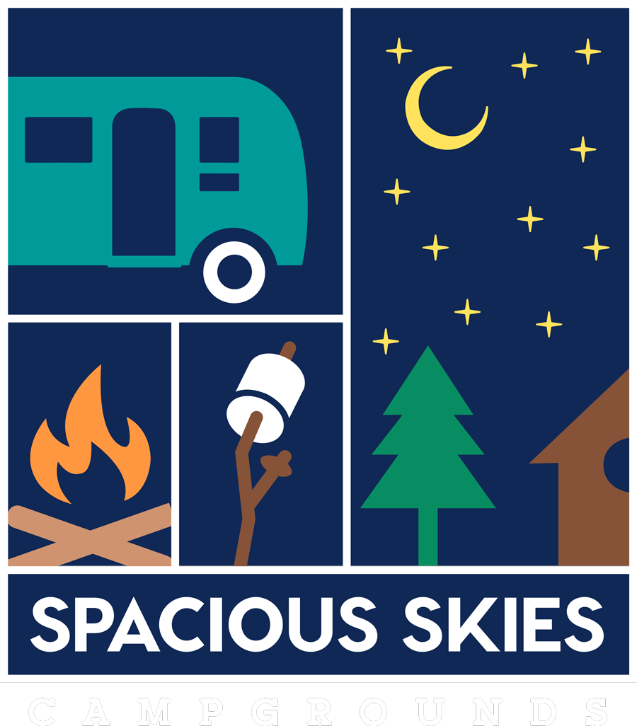Clip art image of an RV, campfire, marshmallows and a cabin.